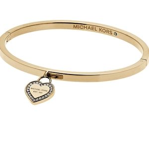 Michael Kors Bracelet 2-2.5 inch inner diameter. Gold color, stainless steel.
